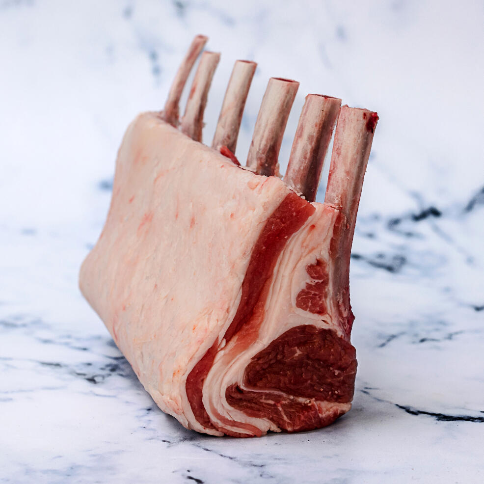 rack of lamb rib on marble background 