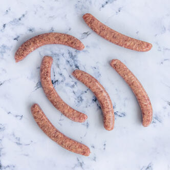 breakfast sausages on marble background