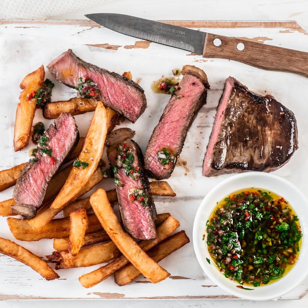 sirloin steak cooked with chips 