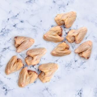 chicken wings on marble background 