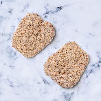 crumbled chicken milanese on marble 