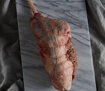 hogget carved leg with herbs and mushrooms prepared