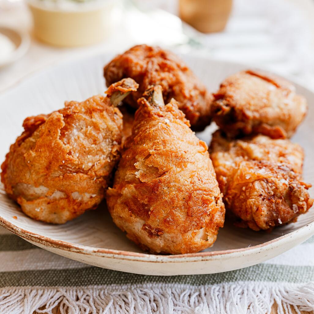 buttermilk fried chicken in a bowl thighs