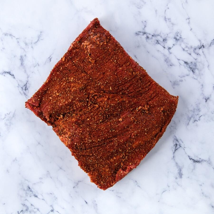 cooked flat beef brisket on marble background 