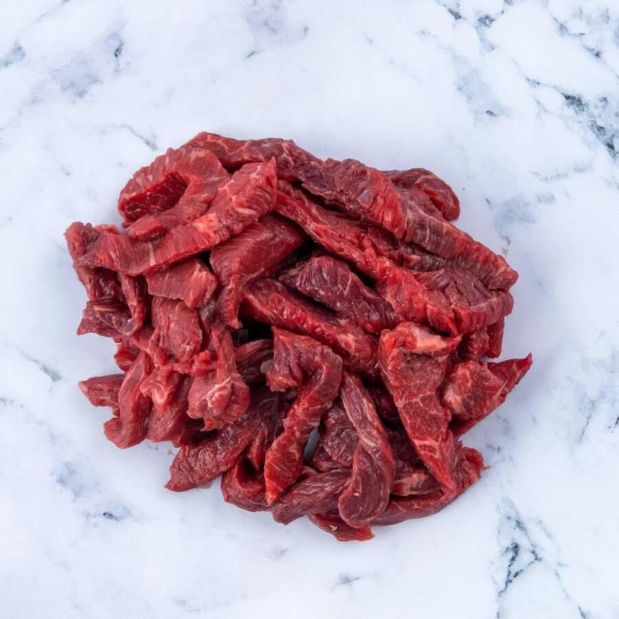 steak strips on marble background