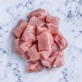 diced pork on marble background