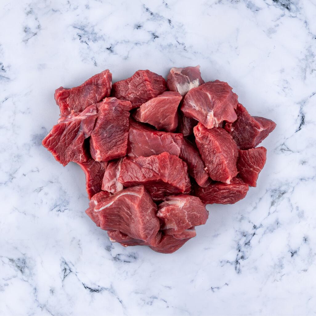 diced lamb on marble background