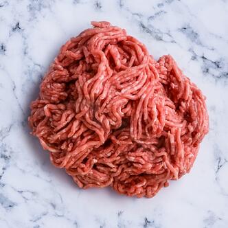 pork mince on marble background