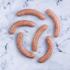 chicken sausage on marble background