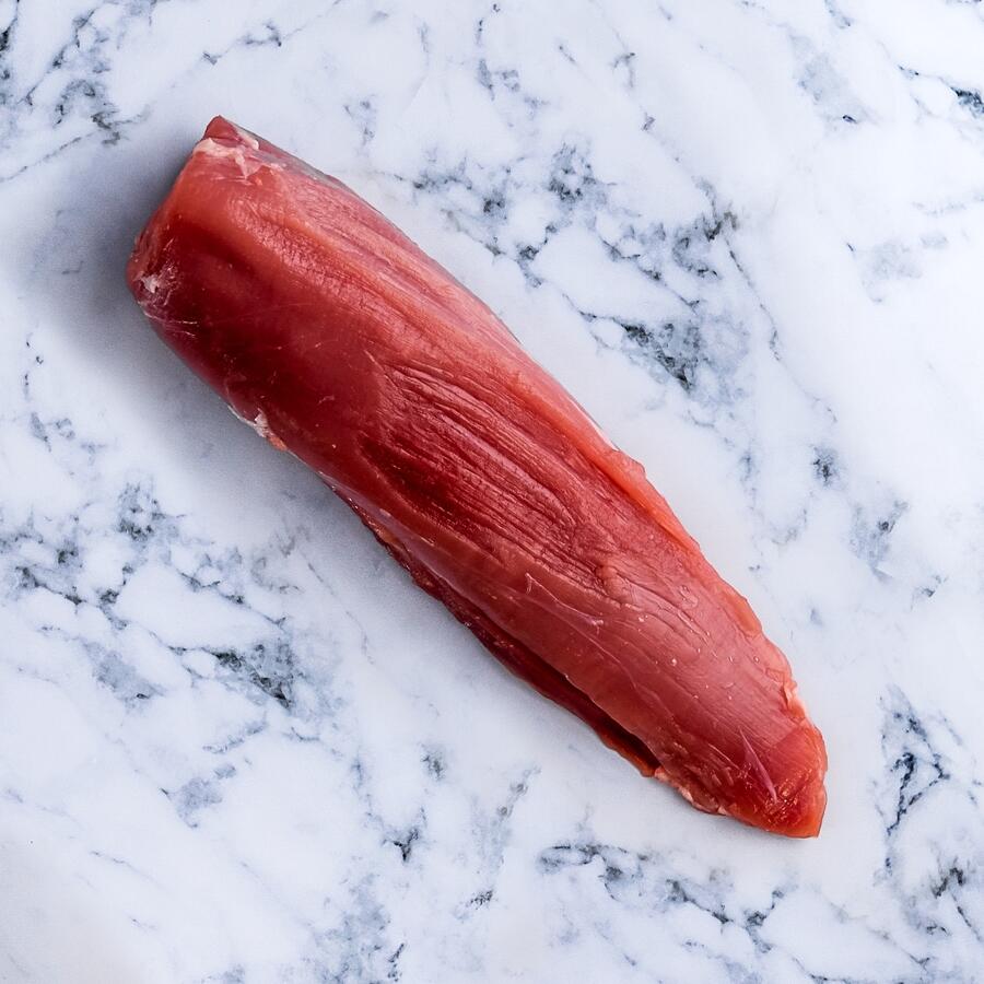 pork tenderloin on marble background