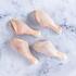 chicken drumsticks on marble background