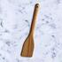 acacia spatula on marble background