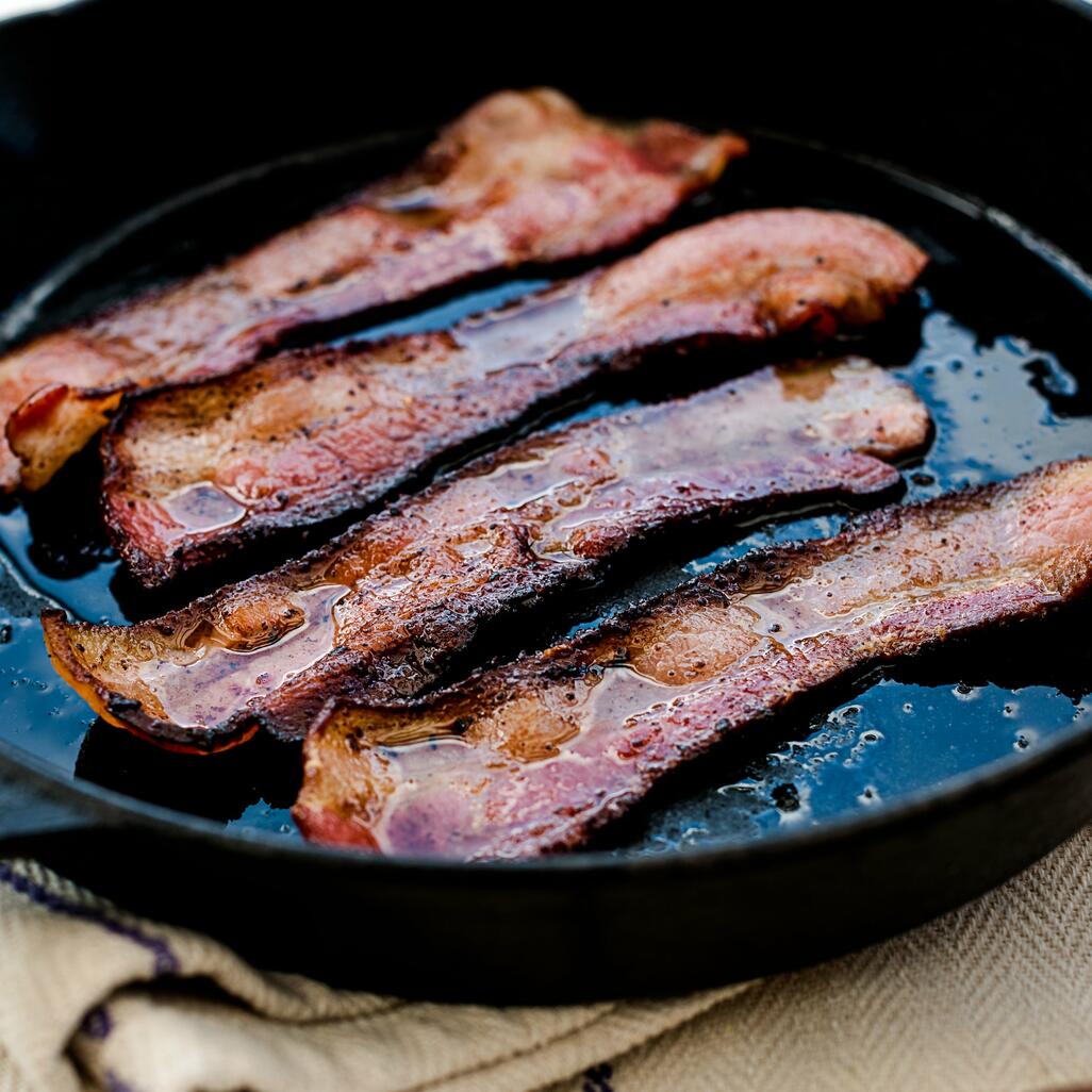 unsmoked streaky bacon cooked