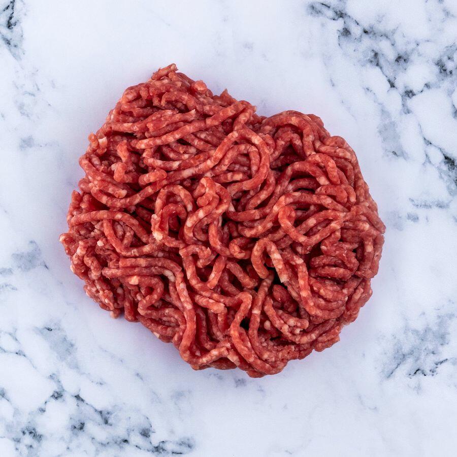 minced mutton on marble background