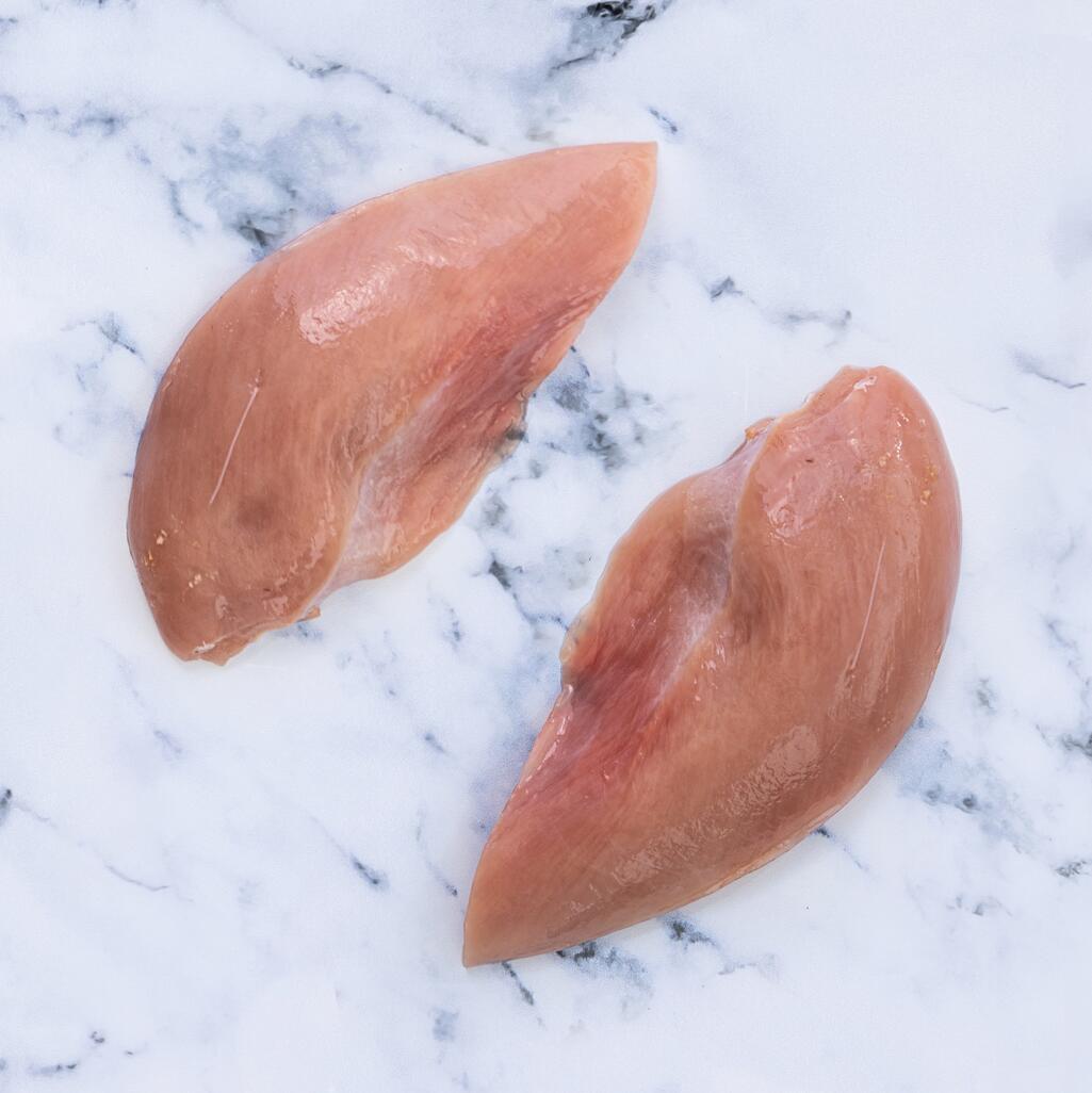 pheasant breasts on marble background