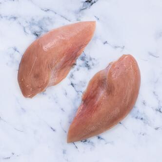 pheasant breasts on marble background