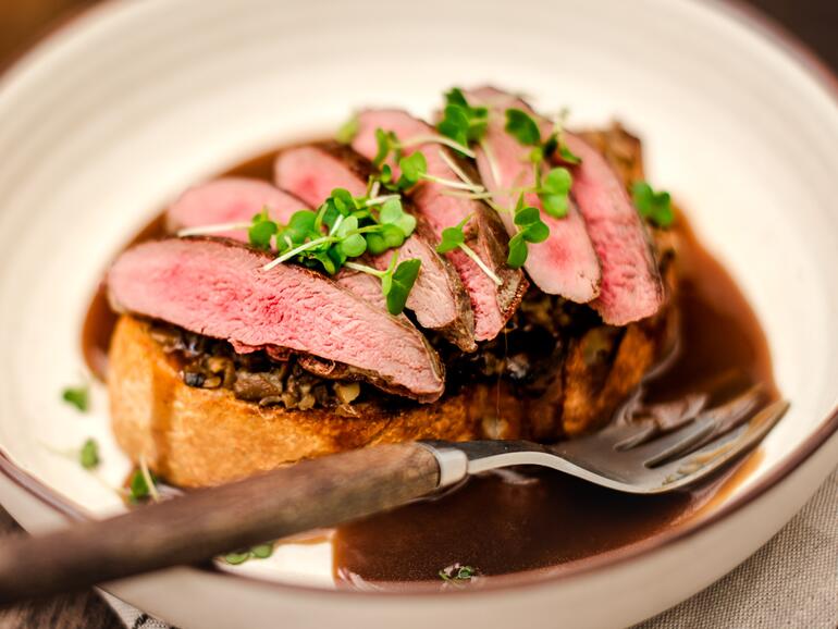 cooked grouse breasts on toast