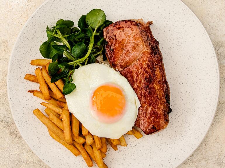 cooked gammon steak, fried egg & chips