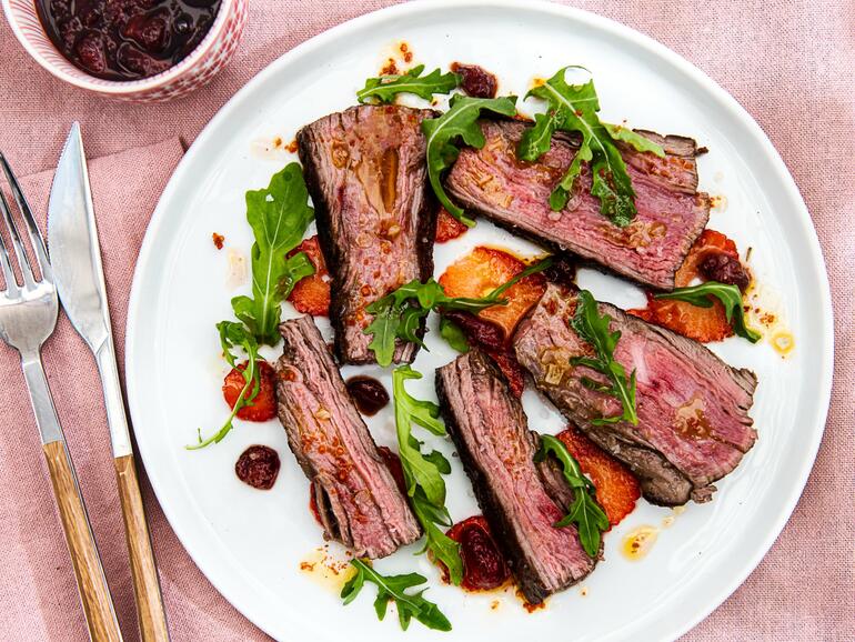 cooked aleppo peppered strawberry relish with grilled steak