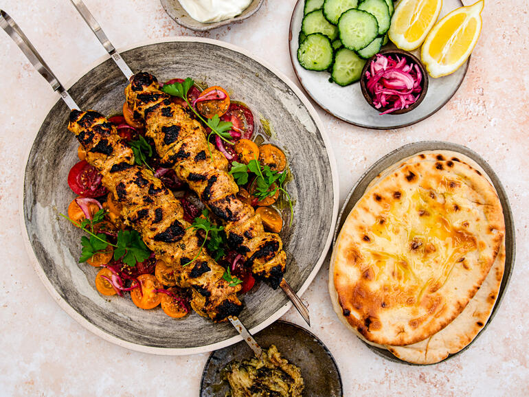 cooked chicken shish and roast garlic bread