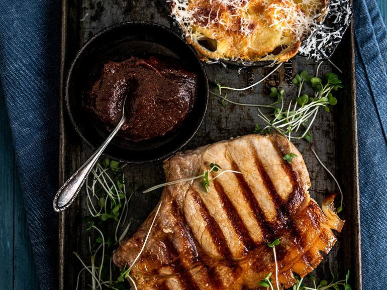 cooked pork chop, parsnip gratin & prune ketchup