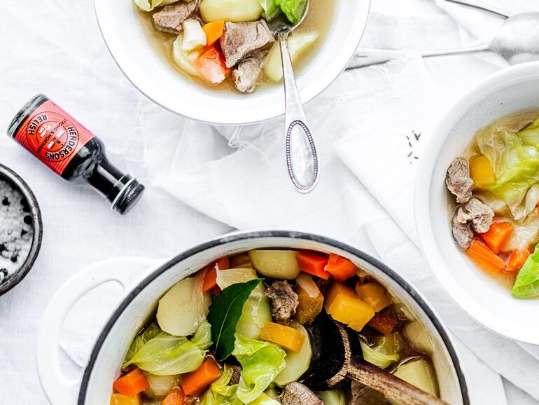 cooked lamb broth with aromatic roots