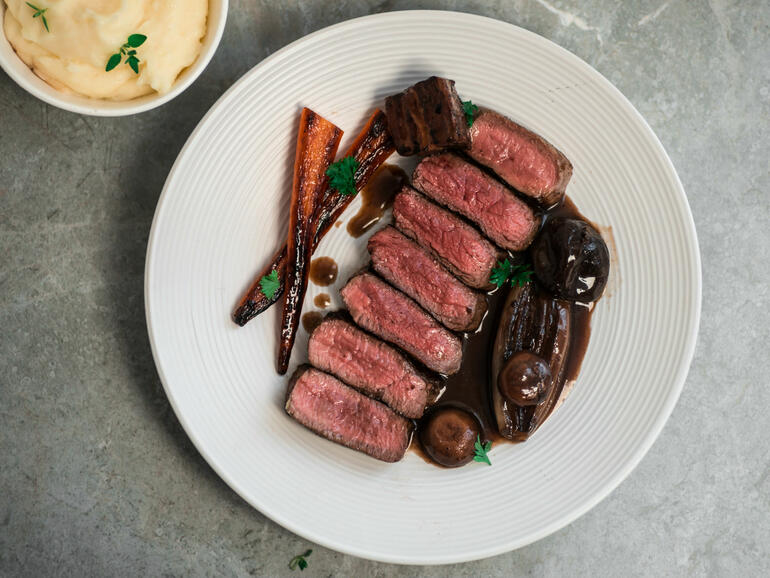 venison steak ‘bourguignon’ cooked 