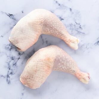 chicken legs on marble background