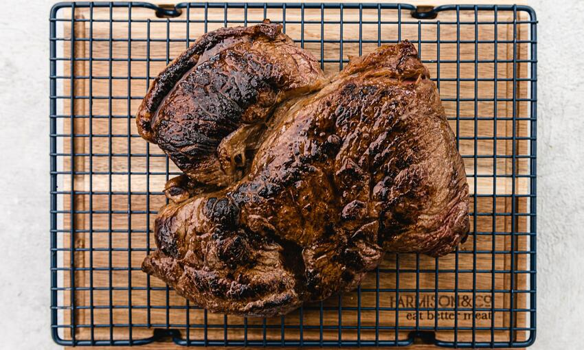 grilled rump steak on resting board