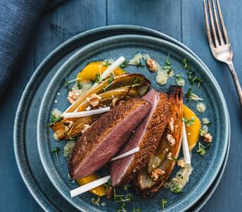 roasted duck steak with chicory & walnut vinaigrette