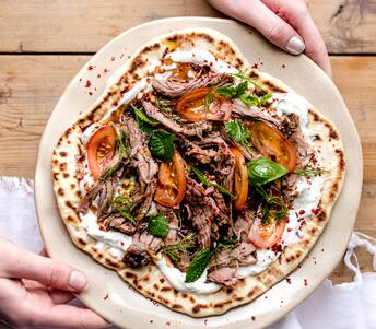 cooked lamb flatbreads with dill yoghurt