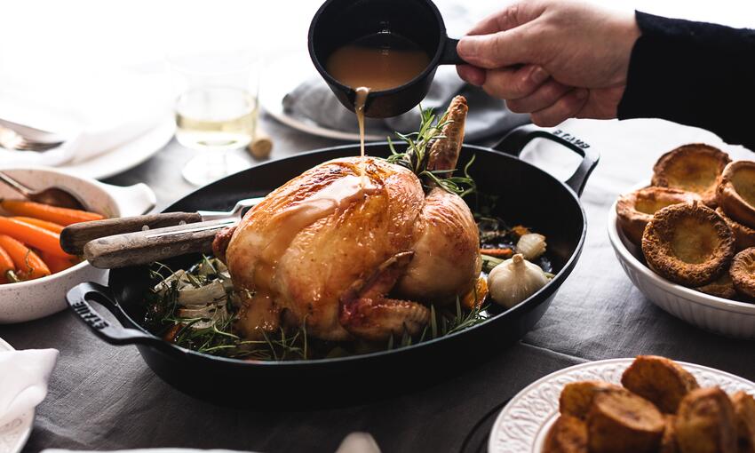 cooked brined roast chicken with yorkshire puddings and gravy