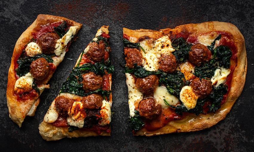 cooked the spicy merguez, goat's cheese and spinach pizza