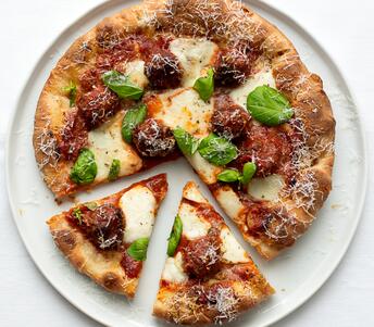 cooked meatball pizza