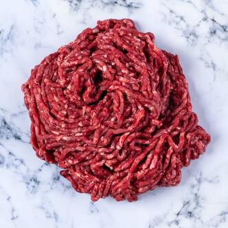 minced venison on marble background