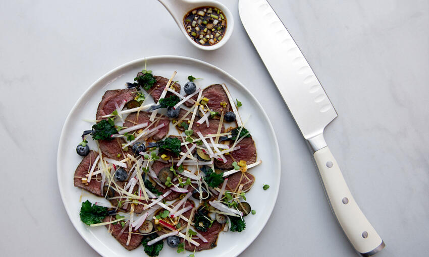 wild venison 'tataki' with blueberries, radish & ginger cooked