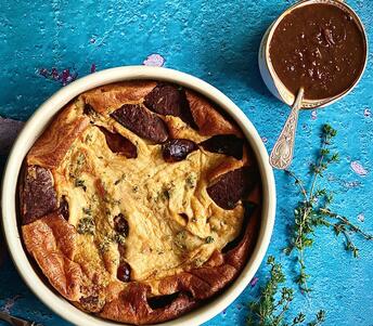 cooked venison toad in the hole with onion gravy