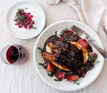 cooked beef short ribs with beetroot and red wine 