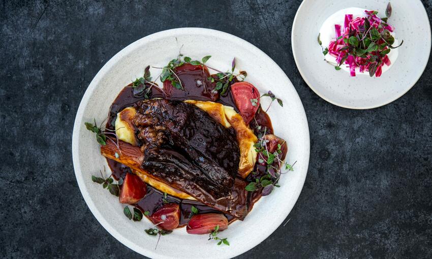 cooked beef short ribs with beetroot and red wine 