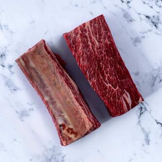 short ribs on marble background 