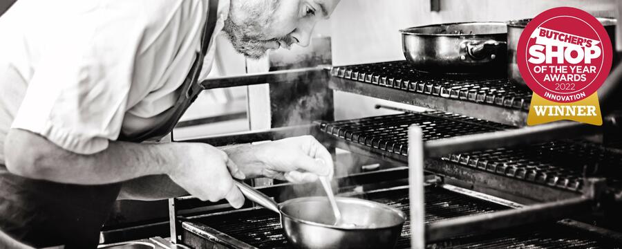 saucepan ready range meals with a stainless steel pan and spoon in the foreground