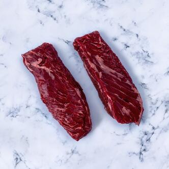 hanger steak on marble background