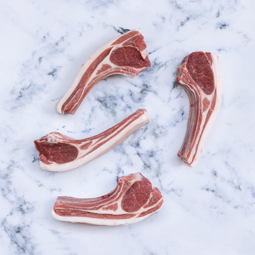 rustic lamb chopped on marble background