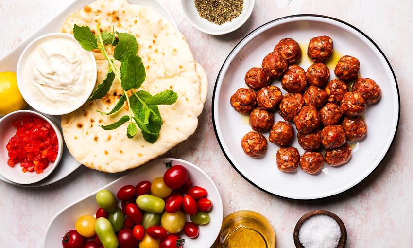 lamb kofta flatbreads with heritage tomatoes 