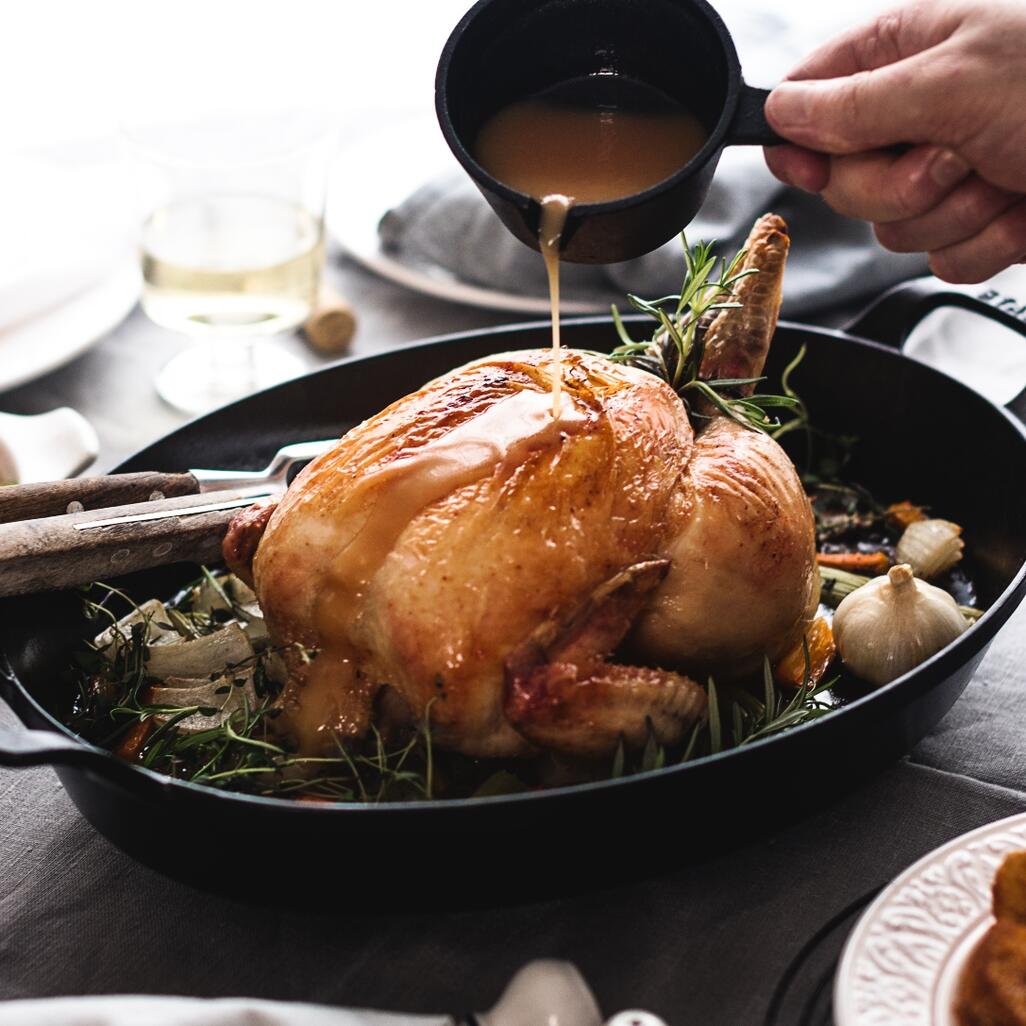 whole chicken cooked and glazed with butter 