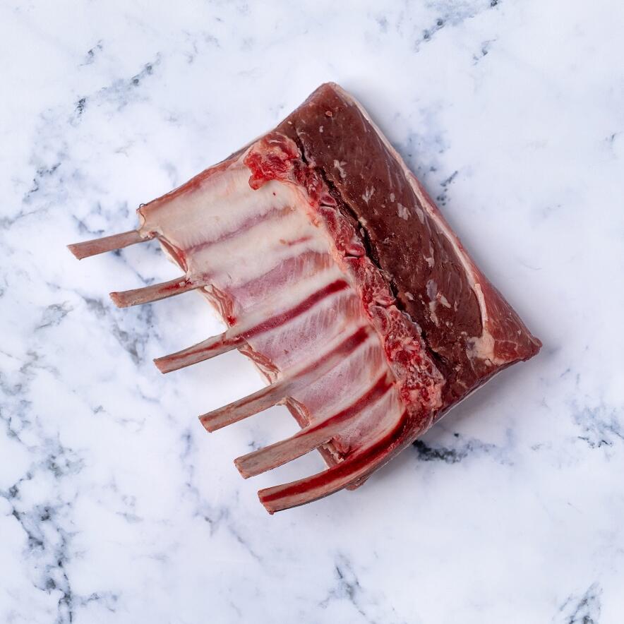 rack of lamb rib on marble background 